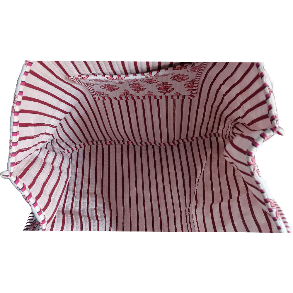 Red and white striped fabric with ruffled edges on a white background