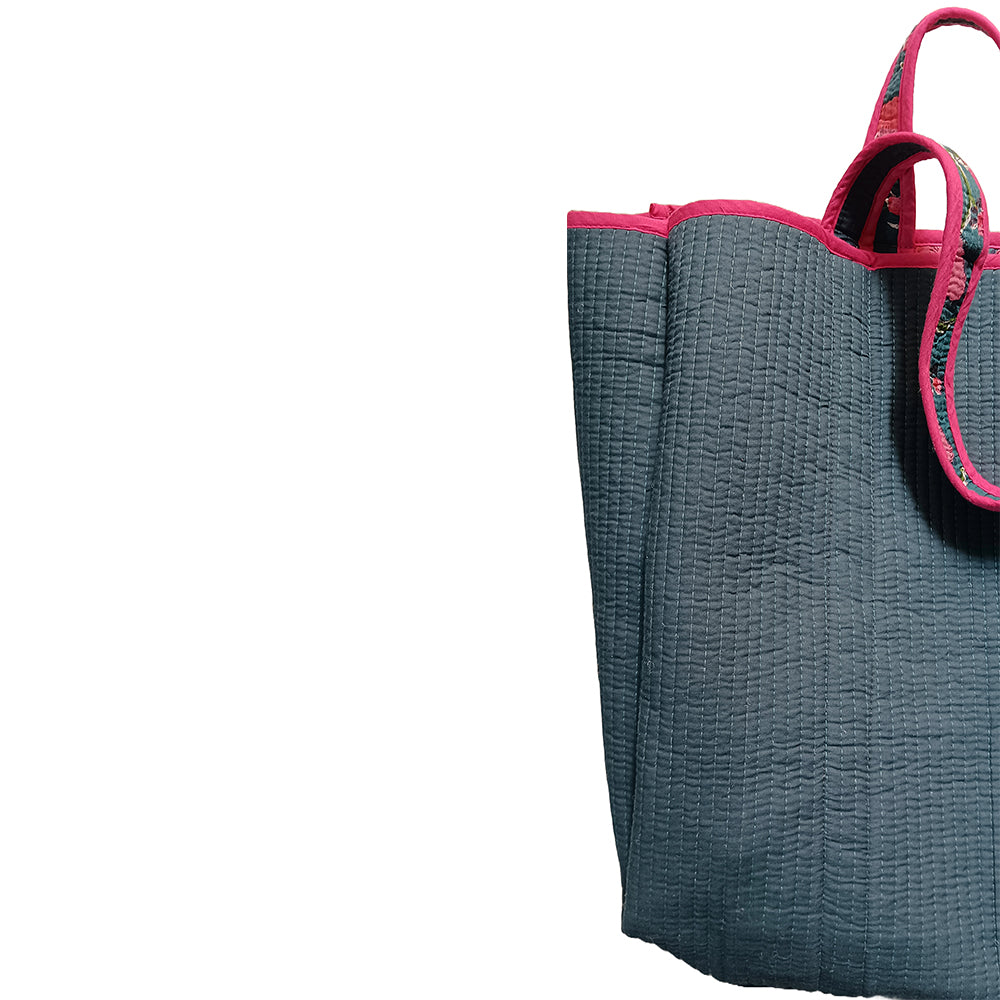 Gray bag with pink trim on a white background