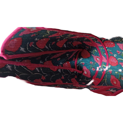 Folded fabric with floral pattern on a white background