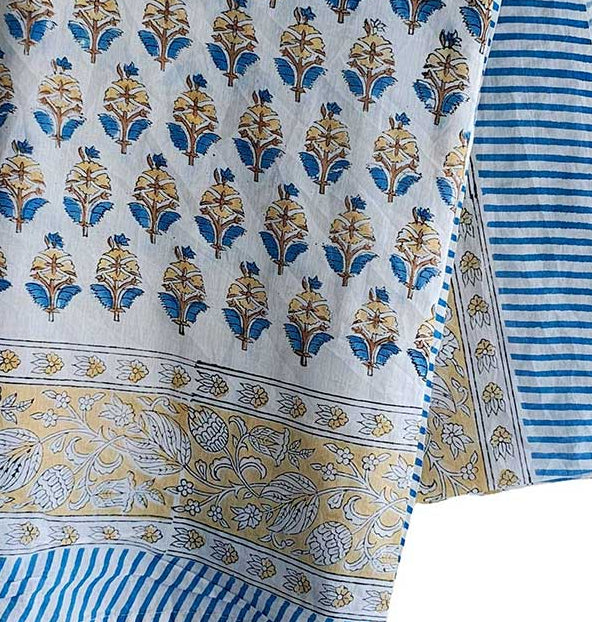 Scarf with floral and striped pattern on a wooden hanger against a white background