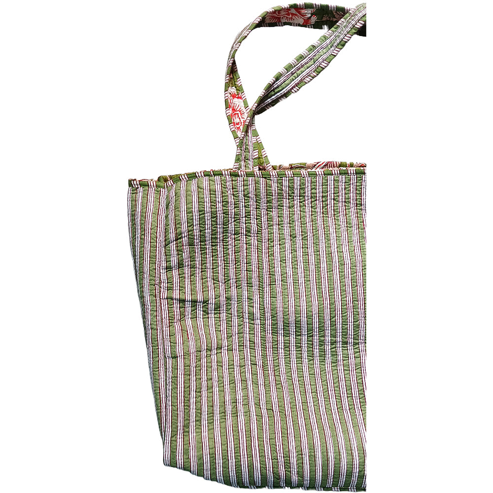 Green and white striped tote bag on a white background