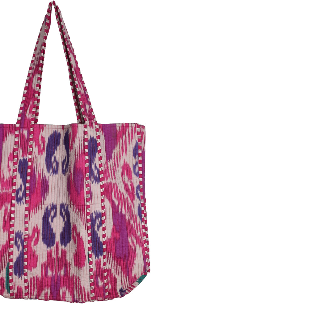 Tote bag with pink and purple pattern on a white background