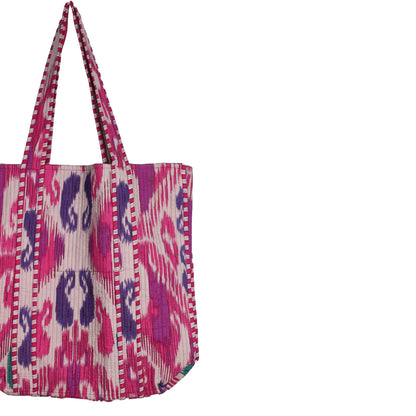 Tote bag with pink and purple pattern on a white background