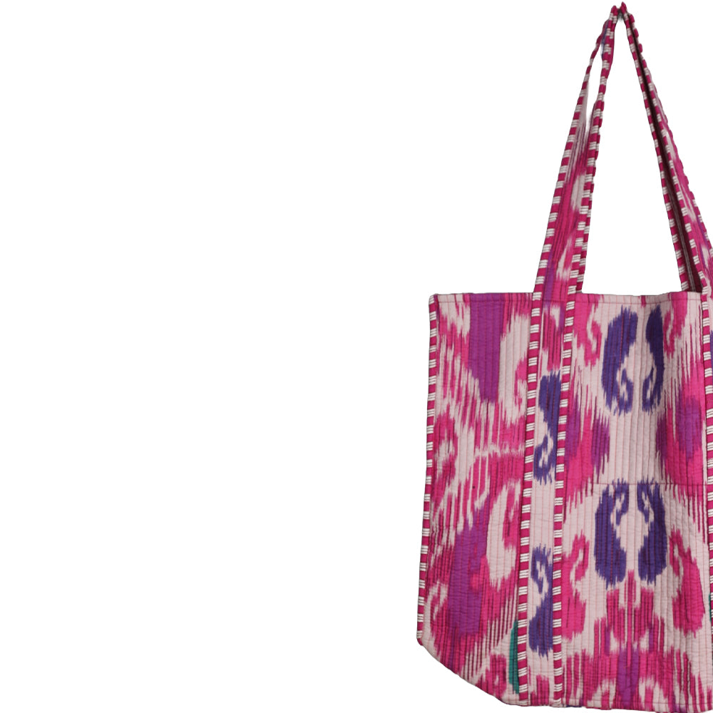 Tote bag with pink and purple pattern on a white background