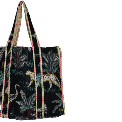 Floral-patterned bag with a strap on a white background