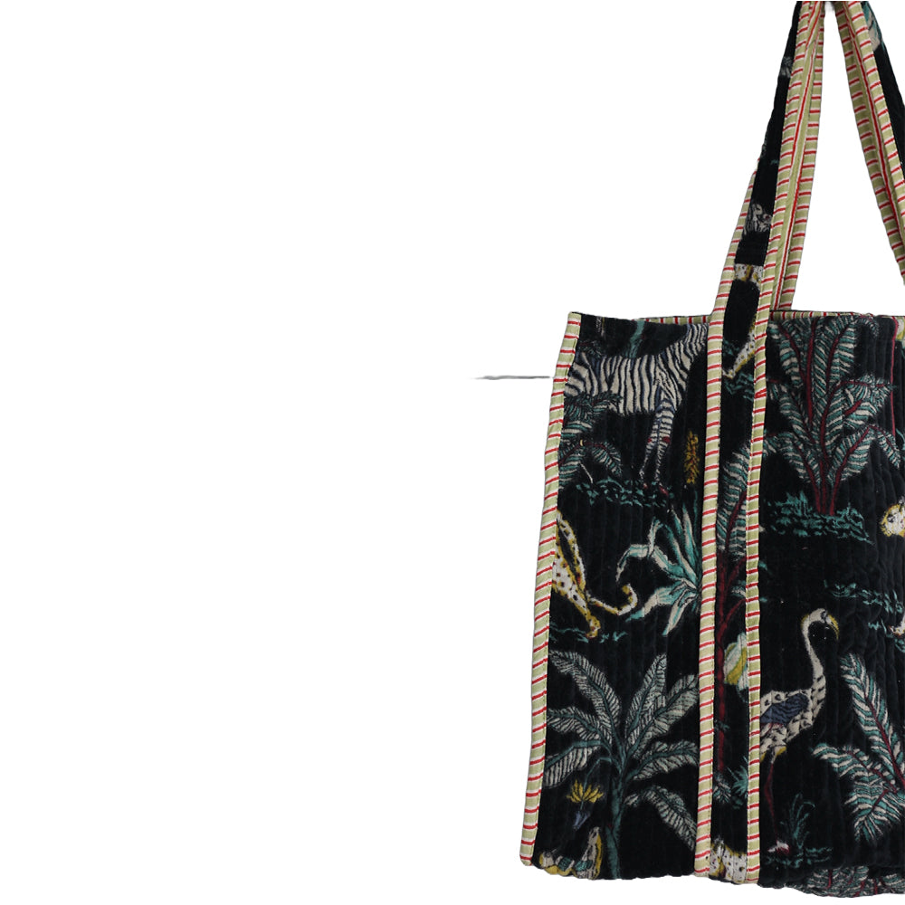 Floral-patterned bag with a strap on a white background