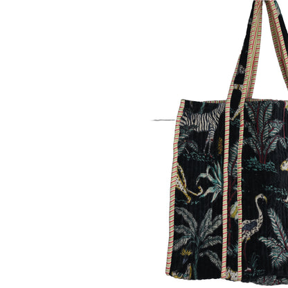 Floral-patterned bag with a strap on a white background