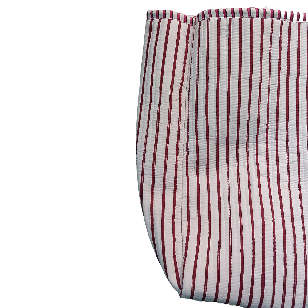 Red and white striped fabric on a white background