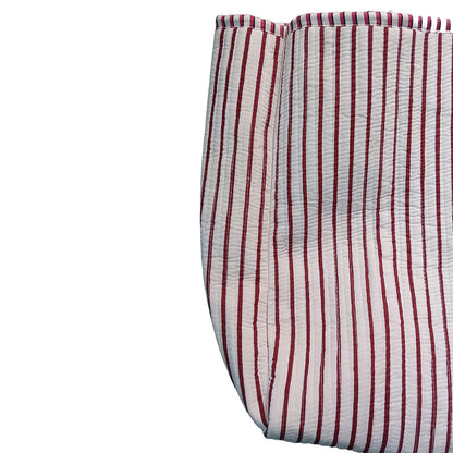 Red and white striped fabric on a white background