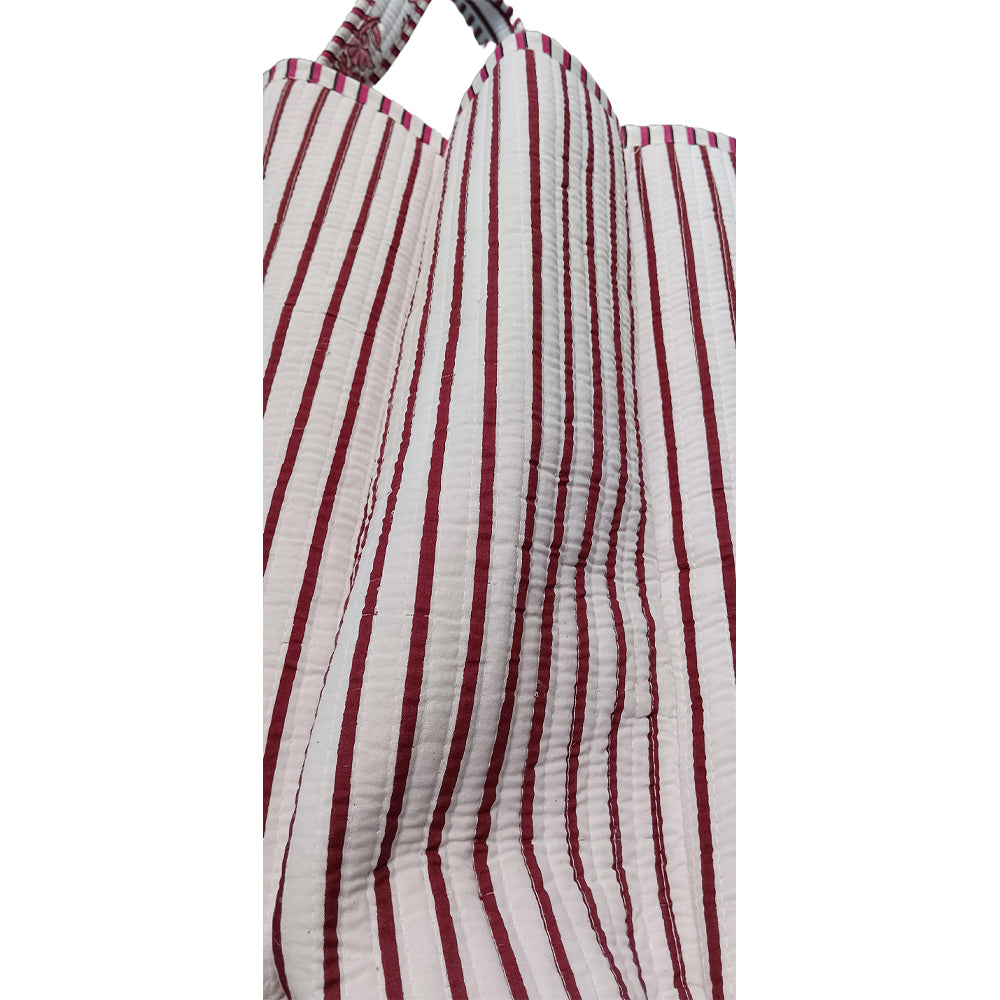 Red and white striped apron on a white background