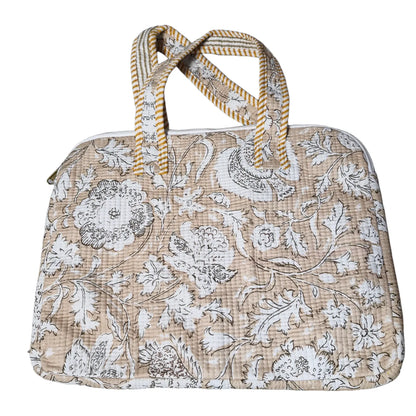 Beige floral block print quilted laptop bag - front view