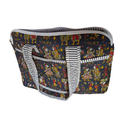 Black folk figure block print laptop bag - close-up of quilted print