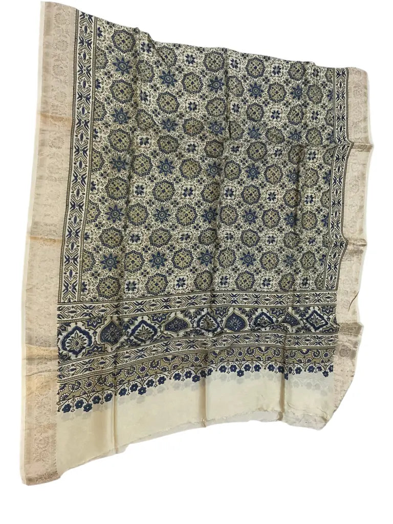 Ivory & Indigo hand block printed Ajrakh dupatta laid flat showing star jaal print, pallu and zari border
