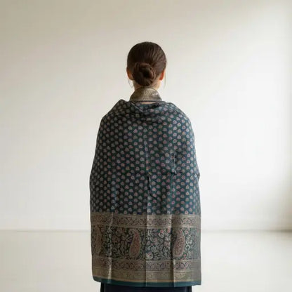 Steel Blue Ajrakh dola silk dupatta with gold zari border styled over a kurta