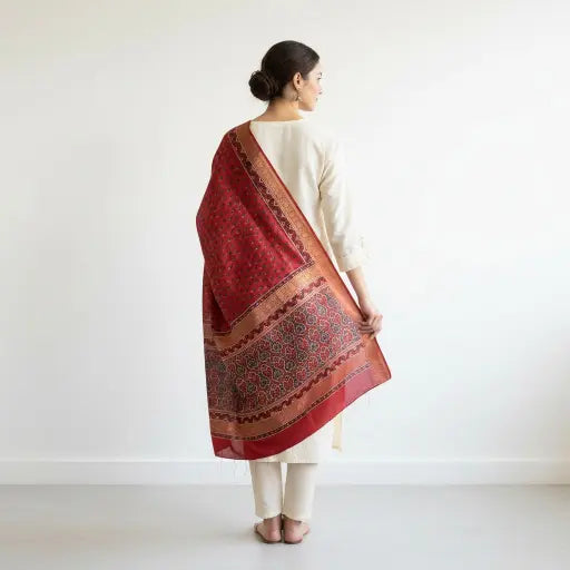 Scarlet Red Ajrakh dola silk dupatta with gold zari border styled over a kurta