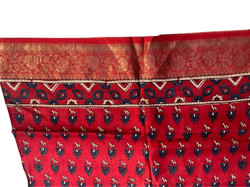 Detail of Ajrakh pallu motifs on scarlet red dola silk dupatta