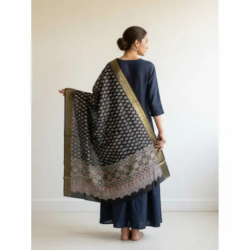 Black & Ivory Ajrakh dola silk dupatta with gold zari border styled over a kurta