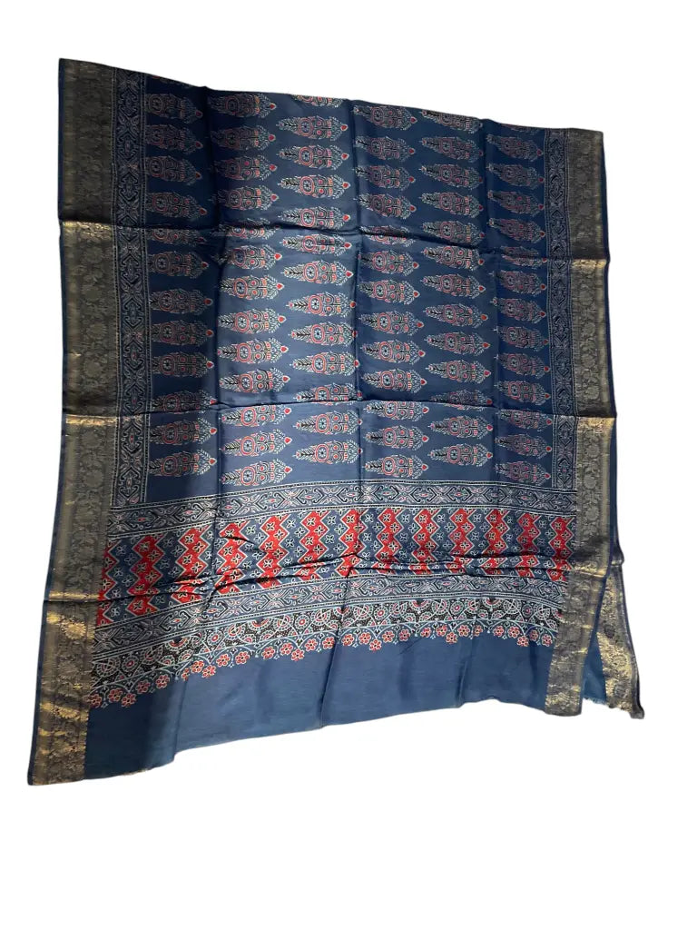 Indigo Blue & Red hand block printed Ajrakh dupatta laid flat showing cypress booti print, pallu and zari border