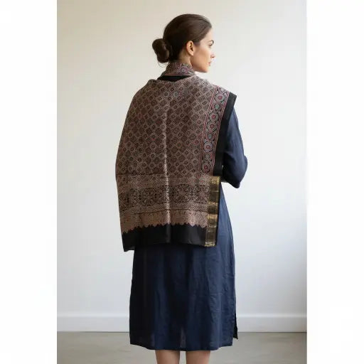 Black & Madder Red Ajrakh dola silk dupatta with gold zari border styled over a kurta