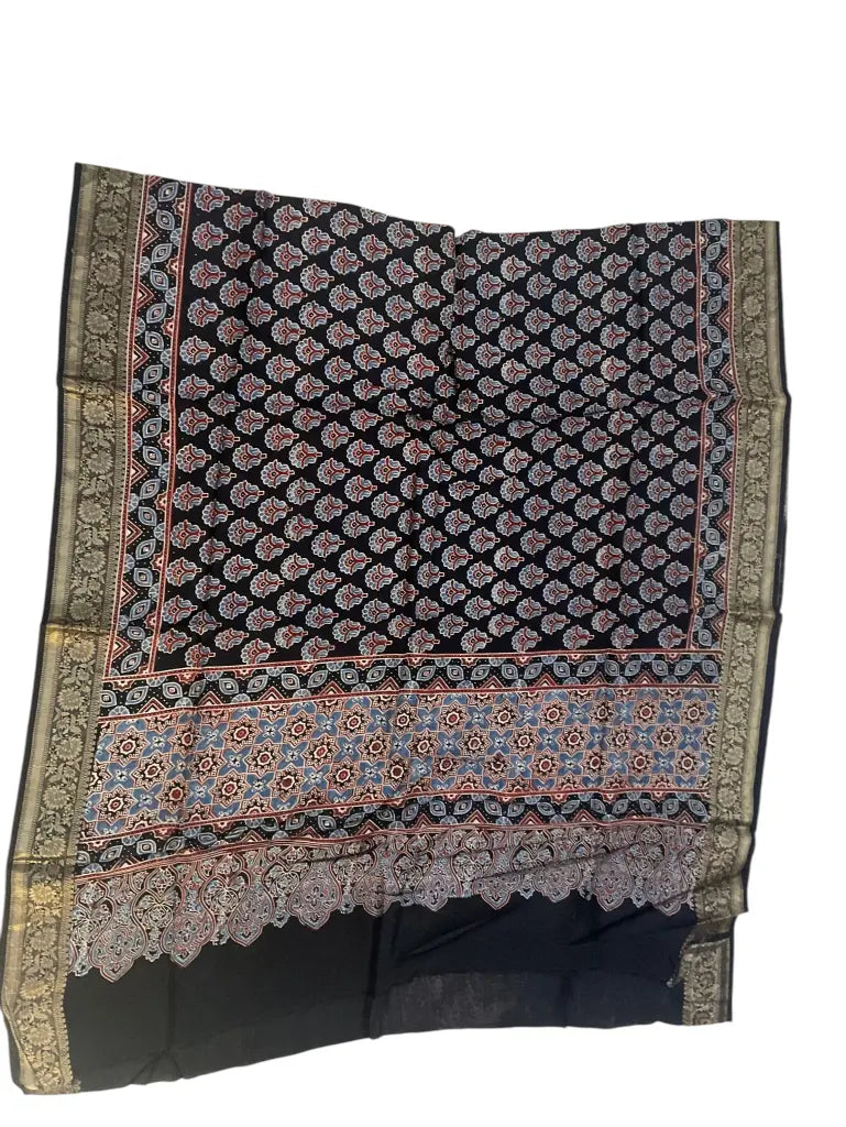 Black & Rose hand block printed Ajrakh dupatta laid flat showing paisley buti print, pallu and zari border