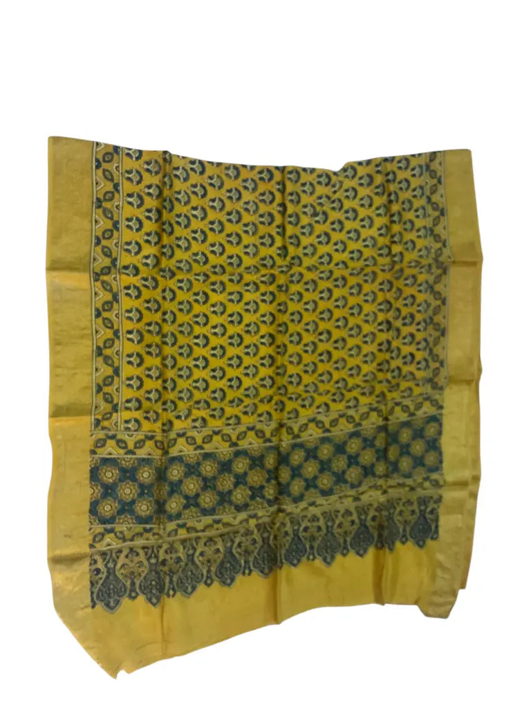 Mustard & Teal hand block printed Ajrakh dupatta laid flat showing star pallu print, pallu and zari border
