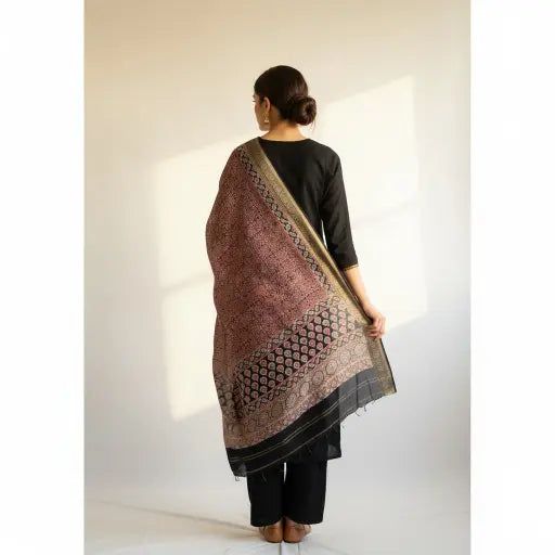 Model wearing rust & black Ajrakh block print dupatta — alternate drape view
