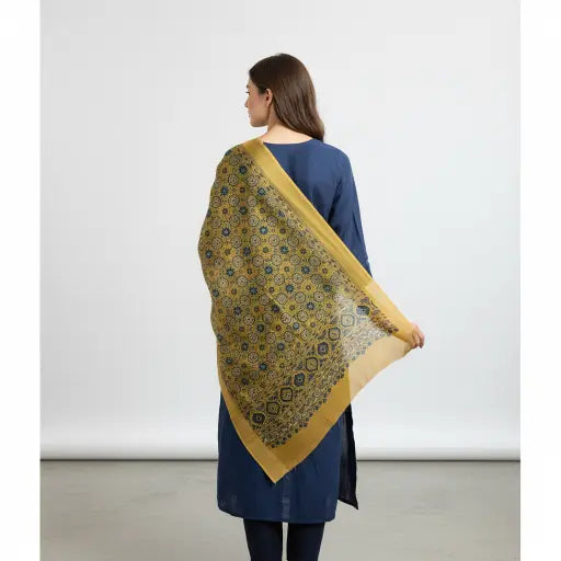Ochre Ajrakh dola silk dupatta with gold zari border styled over a kurta