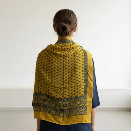 Bright Yellow & Indigo Ajrakh dola silk dupatta with yellow-gold zari border styled over a kurta