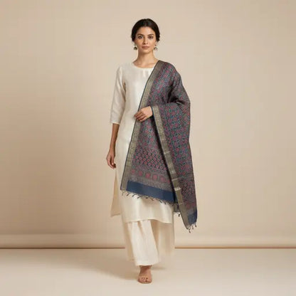 Indigo & Rust Ajrakh dola silk dupatta with silver-toned zari border styled over a kurta