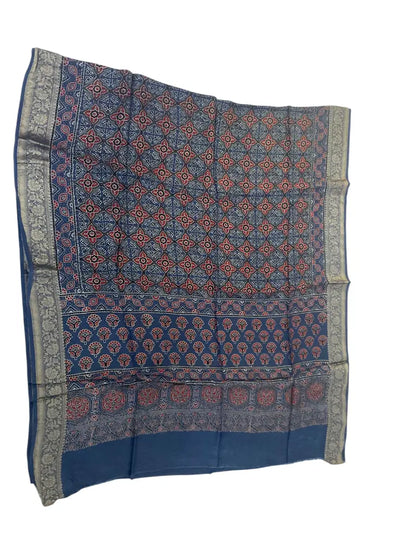 Indigo & Rust hand block printed Ajrakh dupatta laid flat showing floral buti print, pallu and zari border
