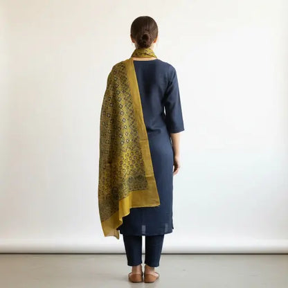 Mustard & Indigo Ajrakh dola silk dupatta with gold zari border styled over a kurta