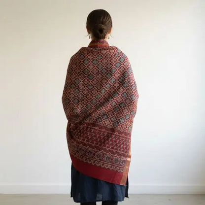Madder Red & Ivory Ajrakh dola silk dupatta with red-gold zari border styled over a kurta