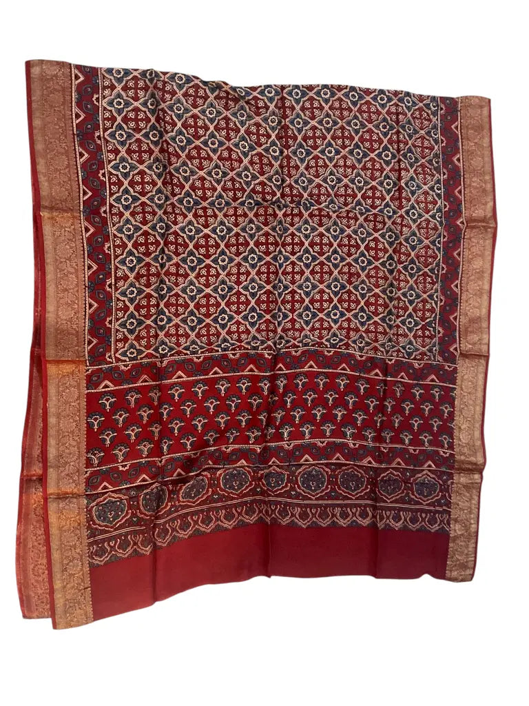 Madder Red & Ivory hand block printed Ajrakh dupatta laid flat showing lattice jaal print, pallu and zari border
