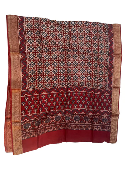 Madder Red & Ivory hand block printed Ajrakh dupatta laid flat showing lattice jaal print, pallu and zari border