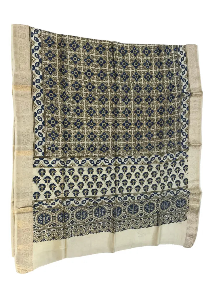 Cream & Indigo hand block printed Ajrakh dupatta laid flat showing geometric jaal print, pallu and zari border