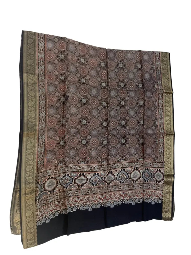 Charcoal Black & Red hand block printed Ajrakh dupatta laid flat showing medallion jaal print, pallu and zari border